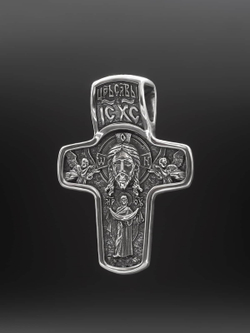 Фотография крестика из серебра с ликом Николая Чудотворца