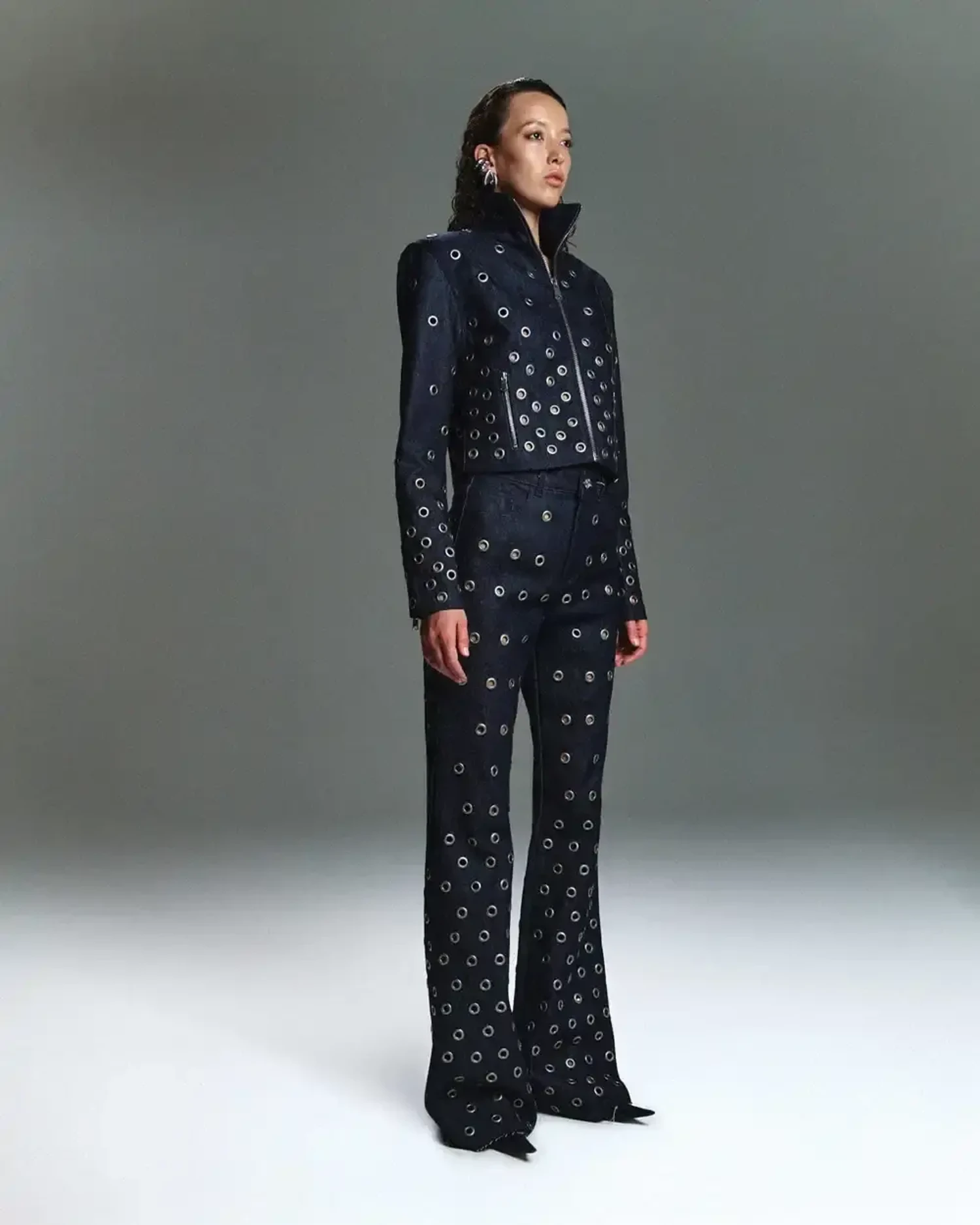 Джинсы Raw с люверсами