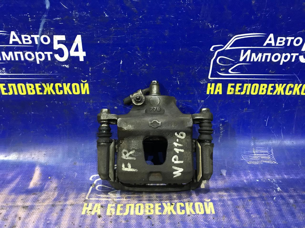 Суппорт тормозной передний правый NISSAN PRIMERA 1997