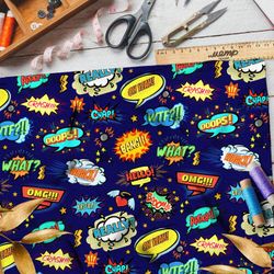 Ткань оксфорд 600 мелкие звуки из комиксов на тёмно-синем фоне