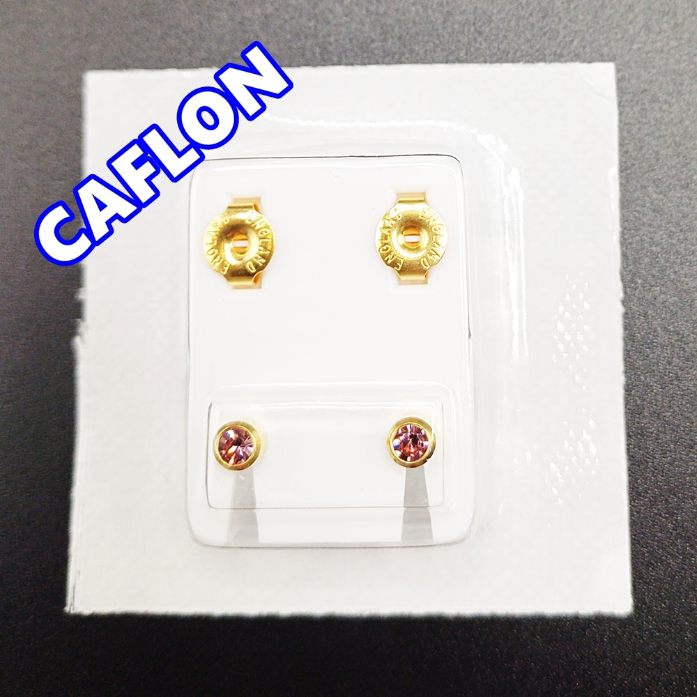 Серьги-гвоздики для прокола ушей под пистолет. CAFLON (Англия). Золотистые со сиреневыми ( Июнь) кристаллами