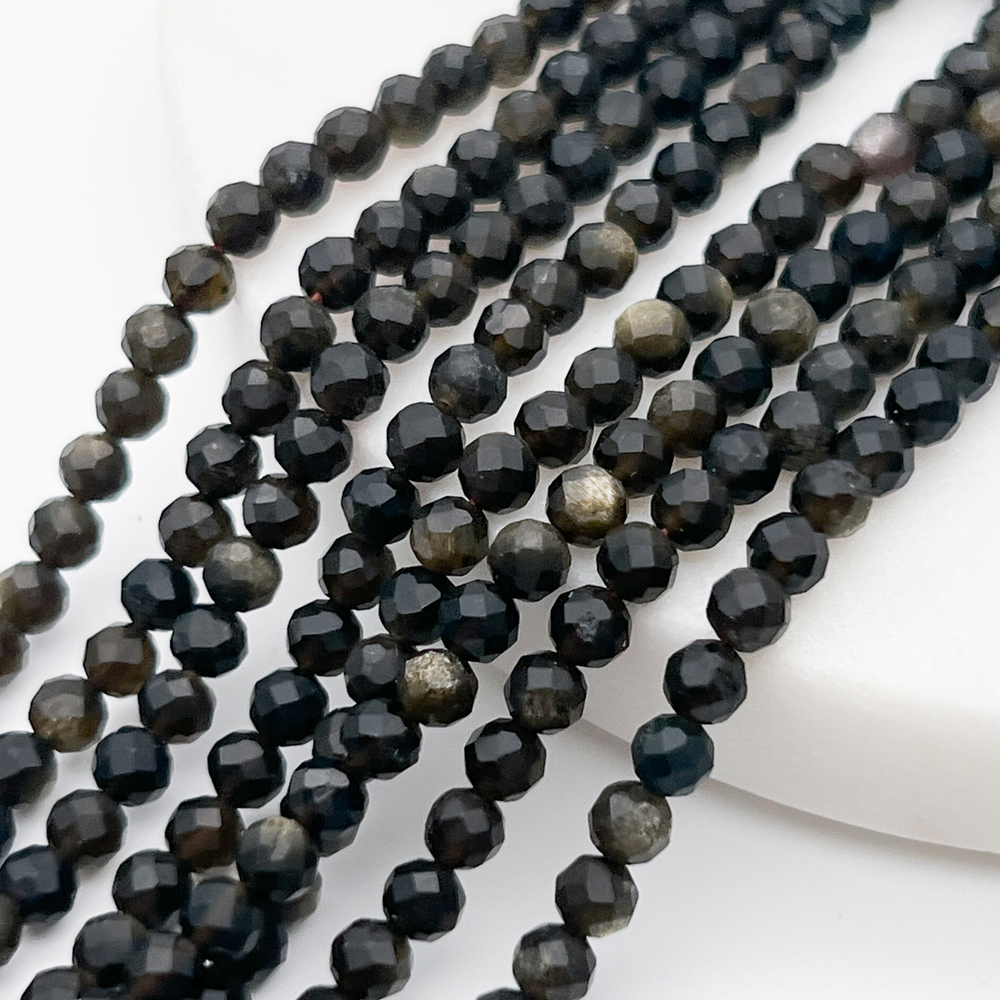 Обсидиан "Золотой" граненый бусины, диаметр около 3,8 мм, цена за отрезок 19 см (1/2 нити)