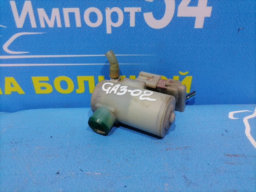Моторчик бачка омывателя Honda LOGO 1996