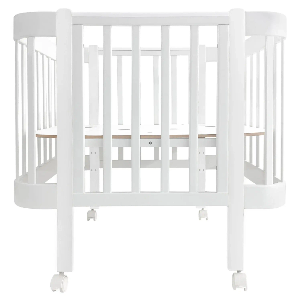 Кровать детская Indigo Italiano Baby продольный маятник на колесах белый-белый