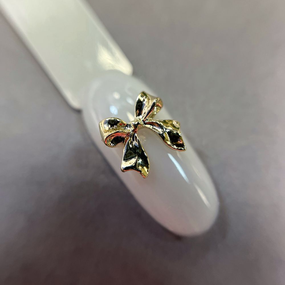 1854 Фигурки объёмные "Бантики" металл 5 шт