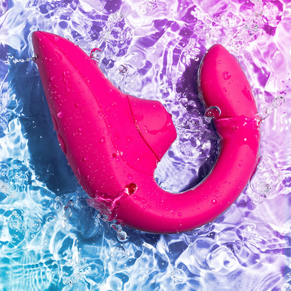 Малиновый вибратор 13,9см с вакуумным стимулятором Womanizer Blend Vibrant Pink WZBD1SG5