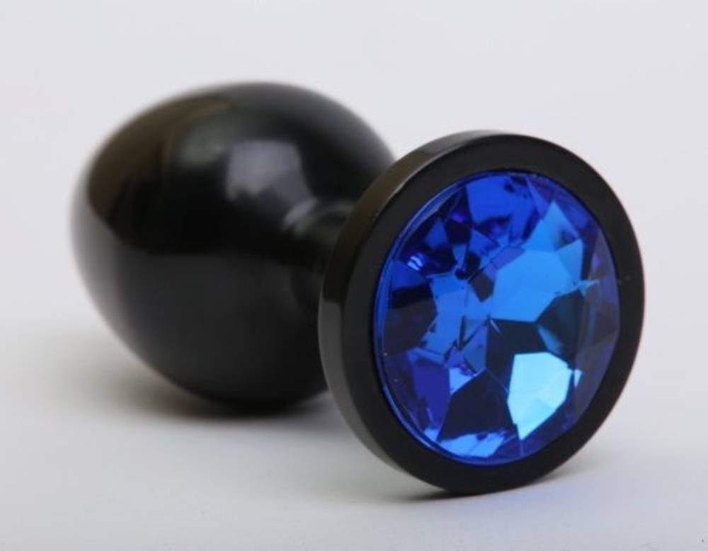 Чёрная анальная пробка с синим стразом - 8,2 см. (Цвет: синий)