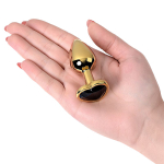 Золотистая коническая анальная пробка 7см с черным кристаллом сердечком ToyFa Metal 717016-135