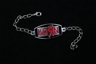 Браслет алюминиевый Korn красная надпись