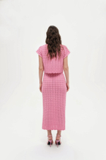 Розовая трикотажная кофточка