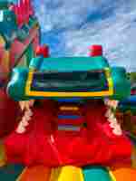 Коммерческий надувной батут «Змей Горыныч» с механизированной головой 14*8*7 м