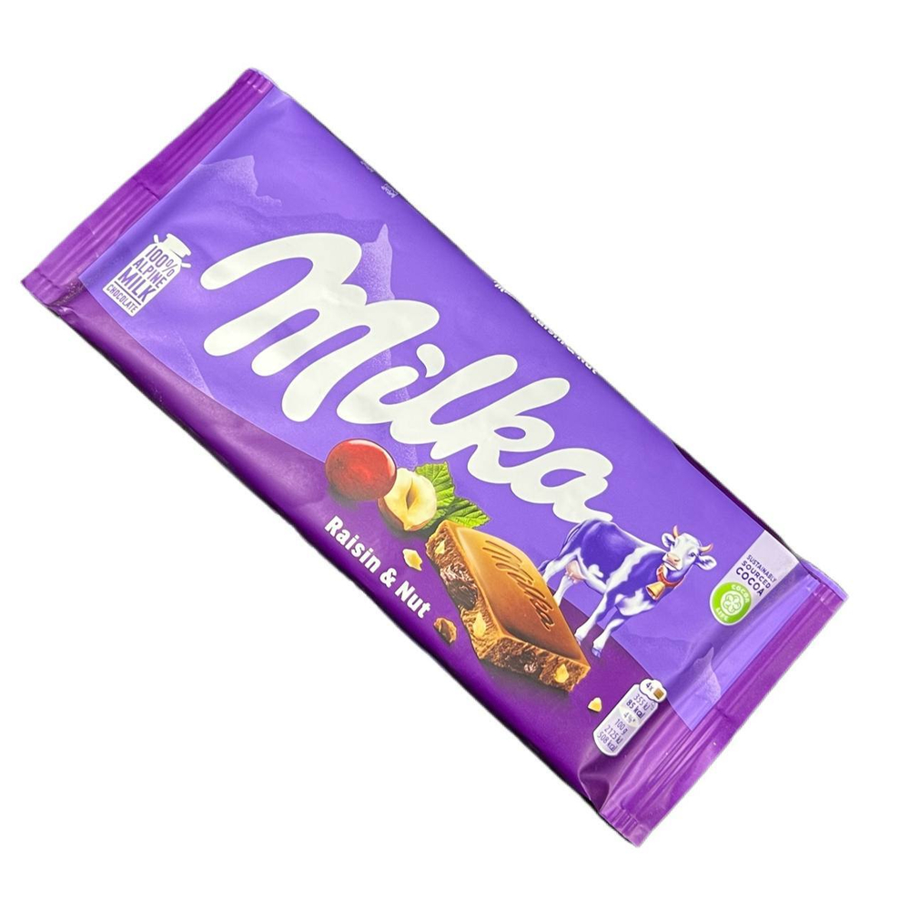 Шоколадная плитка Milka Raisin & Nut Милка Изюм с фундуком 100 г