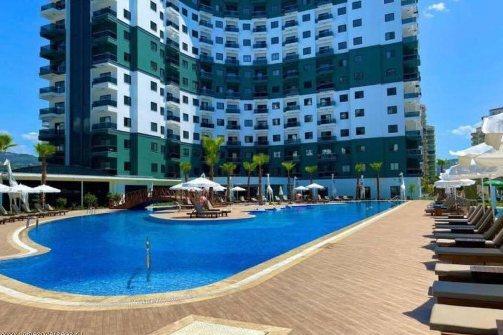 ЖК "AZURA PARK RESIDENCE" Турция, Махмутлар, Аланья. Жилой комплекс AZURA PARK RESIDENCE в районе Махмутлар - это не просто квартира, это билет в беззаботную жизнь уровня премиум-класса, где инфраструктура затмевает многие пятизвездочные отели