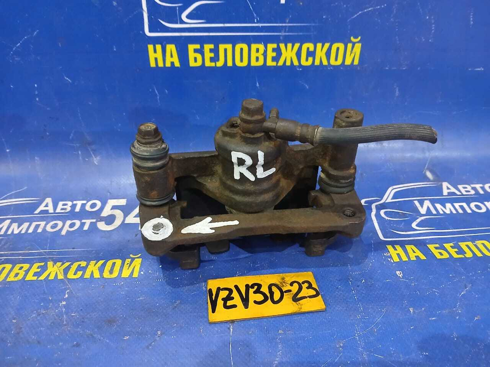 Суппорт тормозной задний левый TOYOTA CAMRY PROMINENT 1991