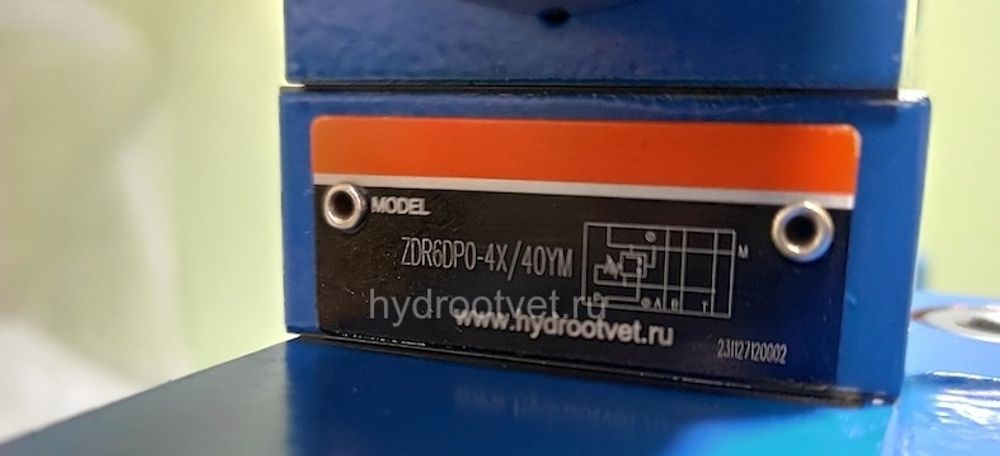 4WRKE32W6-600L-3X/6EG24ETK31/A1D3M - Пропорциональный распределитель с обратной связью по положению золотника и со встроенным усилителем (OBE), Ду32, A1 = ±10 В, номинальный расход 600 л/мин, схема W6-, каналы управления ET = X и Y - внутренние