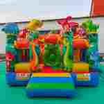 Коммерческий надувной батут «Весёлые динозаврики» с горкой, 5*4*2,8 м
