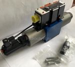 4WREE10W50-2X/G24K31/A1V - Пропорциональный распределитель с обратной связью по положению золотника со встроенным усилителем Ду10, A1 = ±10 В, номинальный расход 50 л/мин, схема W