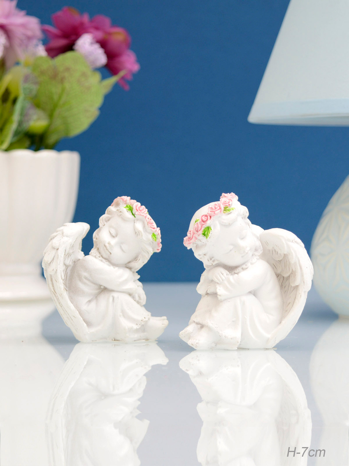 Фигурка Ангел спящий на правом плече с венком из роз