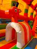 Коммерческий надувной батут «Страна Сафария 2» с крышей и двумя горками, 12*6*6 м