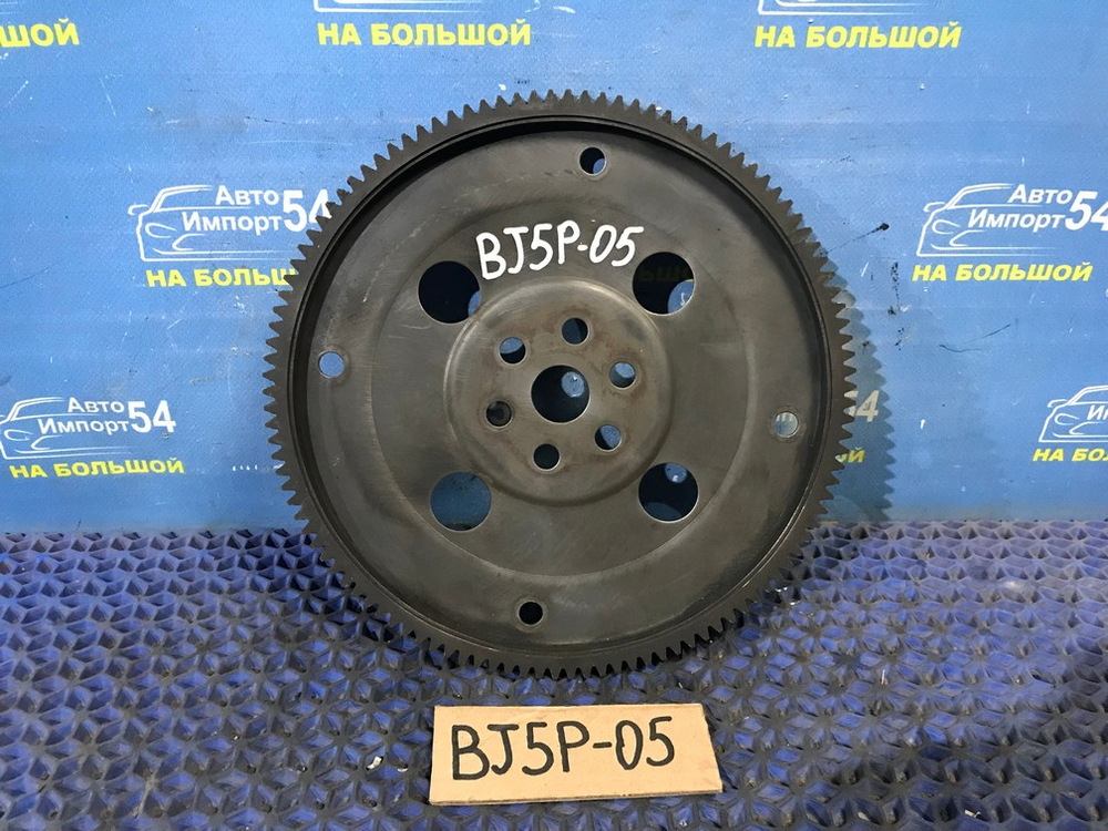 Маховик MAZDA FAMILIA 2000