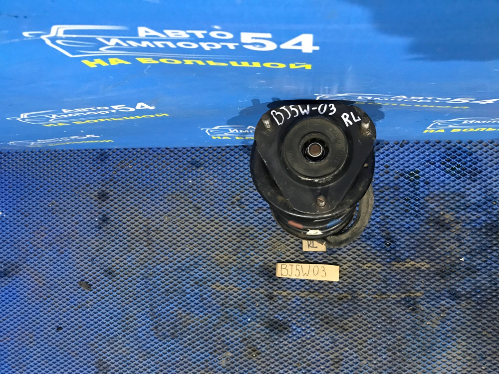 Стойка задняя левая MAZDA FAMILIA 2001