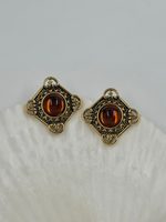 Серьги с коричневыми кабошонами Avon