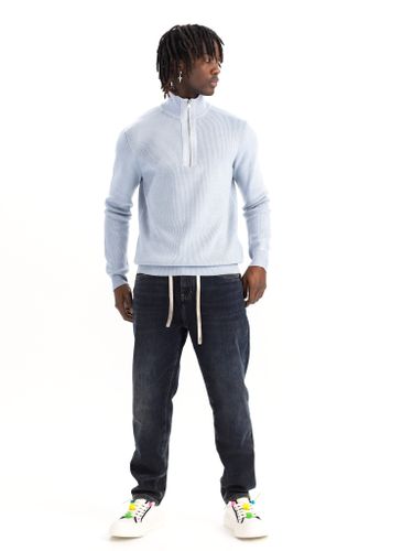 Темные мужские утепленные джинсы приталенные