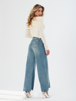 Джинсы с обработанным краем