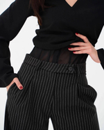 брюки в полоску