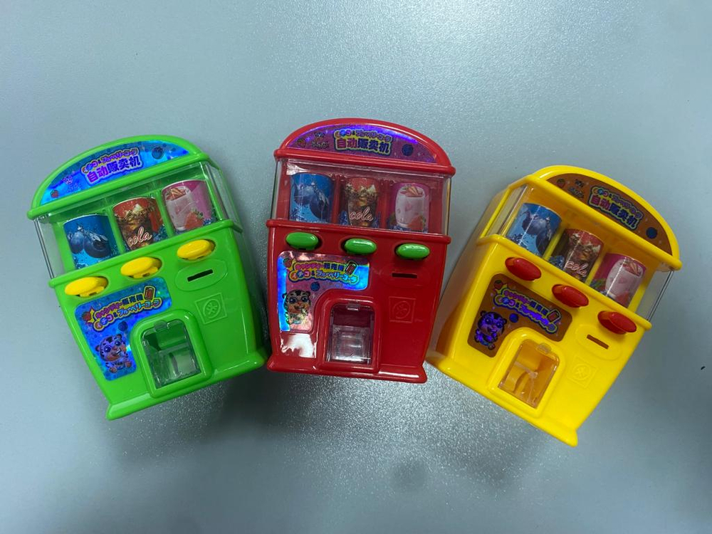 Жевательные конфеты с игрушкой Торговый автомат TAI LE HU 15гр