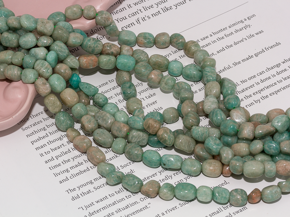 Нить бусин из амазонита 7х9мм (галтовка)