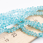 Бусина Треугольник, стекло, цвет голубой, размер около 3,5*4,5 мм, цена за нить 38 см