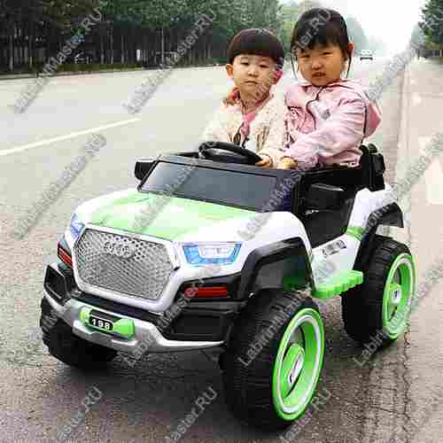 Детский электромобиль "Audi" бело-зелёный 129x76x75cm