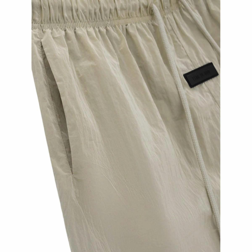 Шорты Fear of God Essentials SS24 drop2 Crinkle Nylon Running Short Logo /GARDEN YELLOW, 160SP244131F