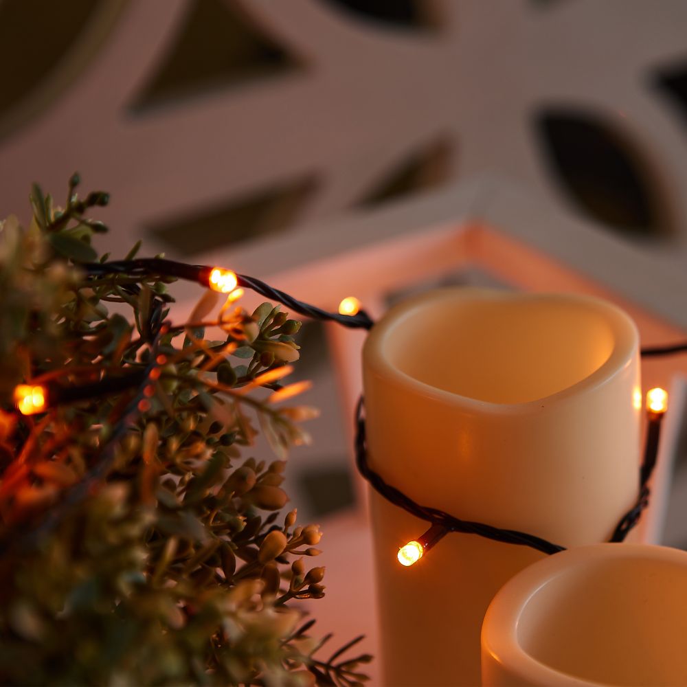 ULD-S2000-200-DGA AMBER IP20 Гирлянда светодиодная. 20м. 200 светодиодов. Янтарный свет. Провод зеленый. ТМ Uniel