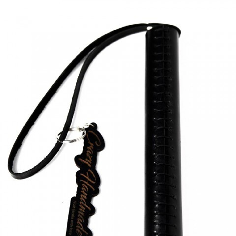 Флоггер из черной кожи с  прошивкой