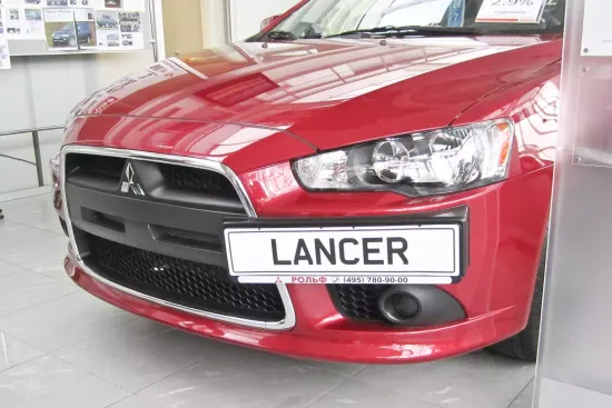 Рамка под номер на передний бампер для Mitsubishi Lancer 10