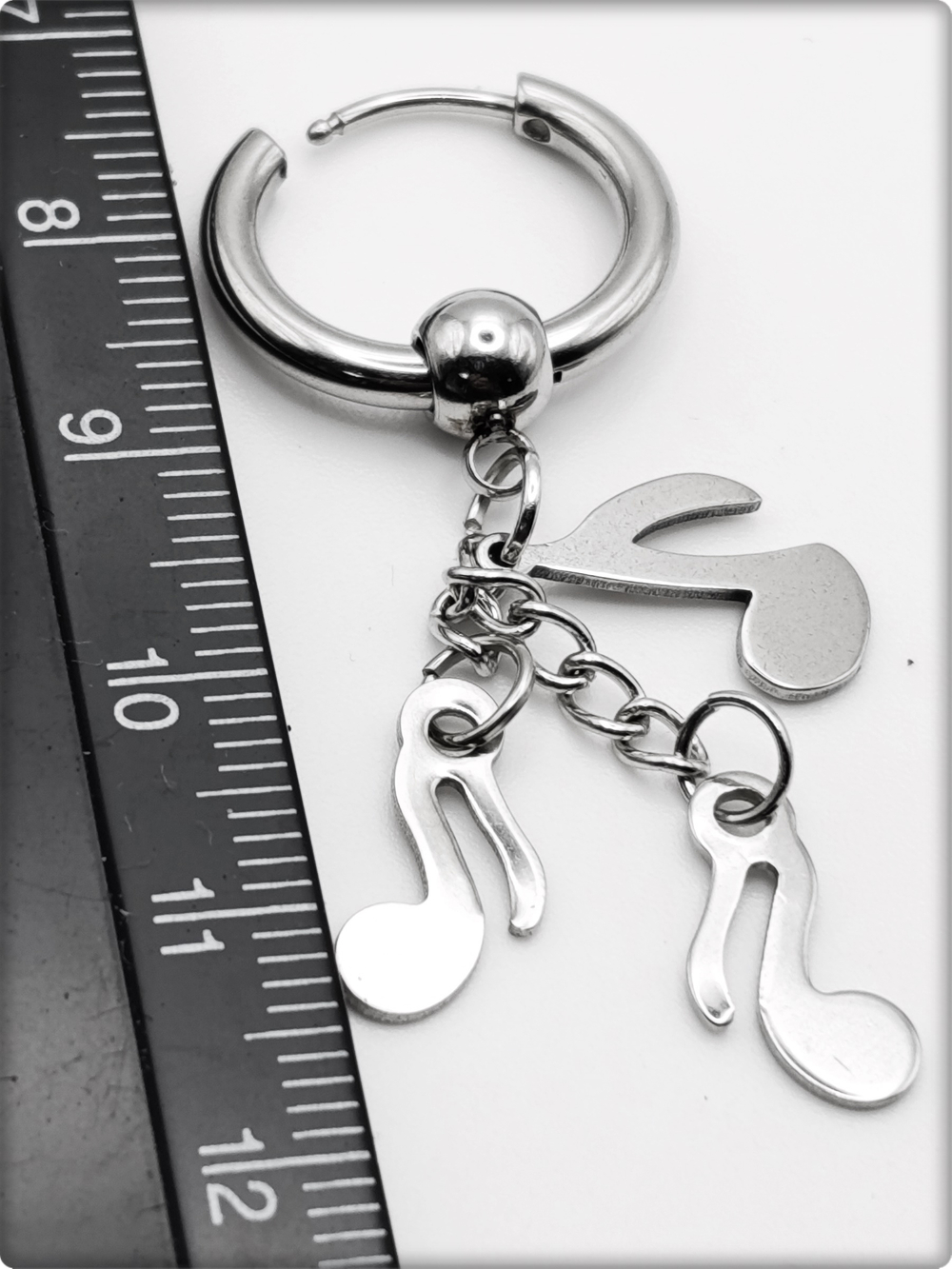 Серьги кольца "Гитара, ноты" асиметричные стальные.