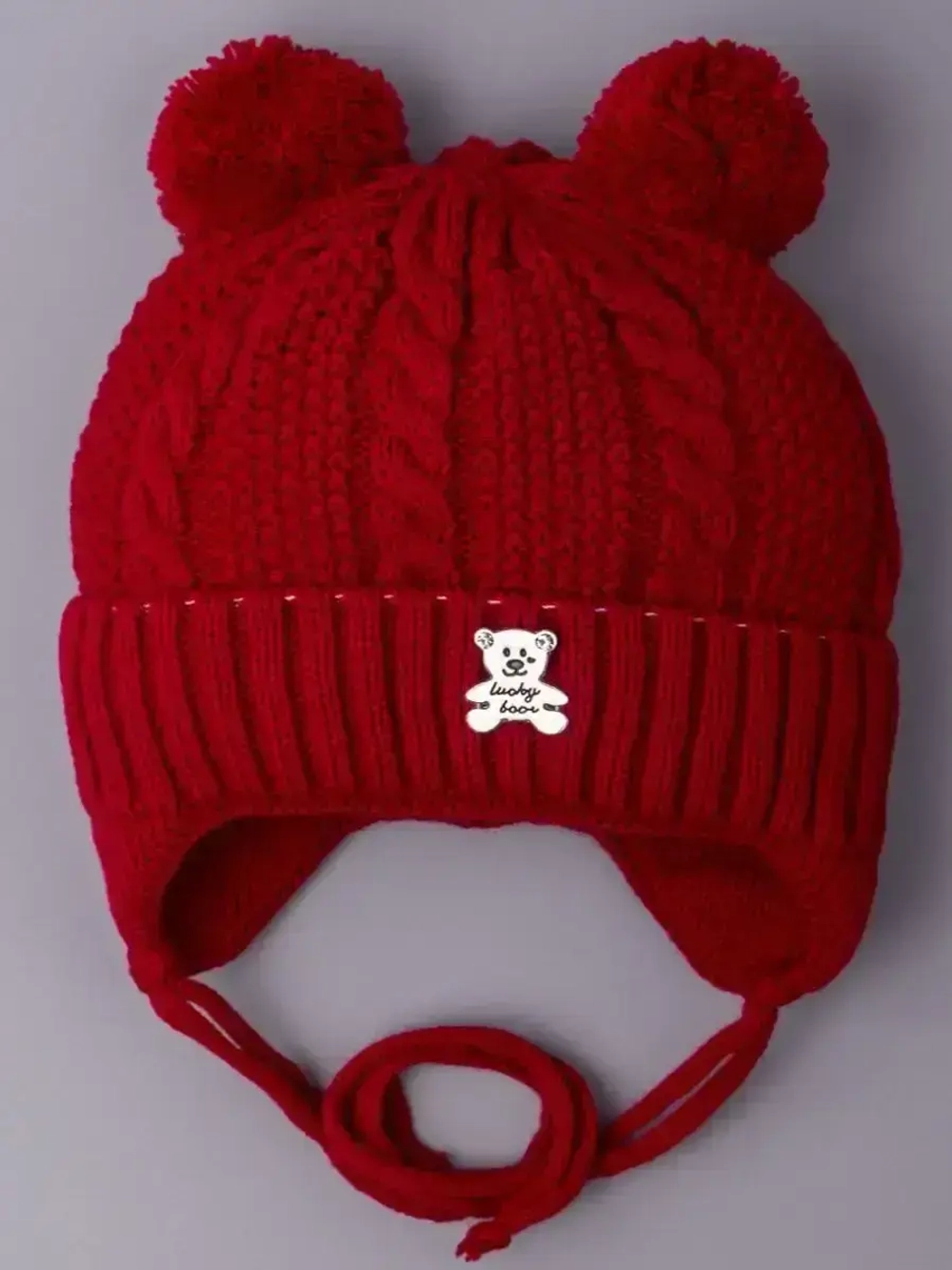 Шапка вязаная демисезонная на завязках