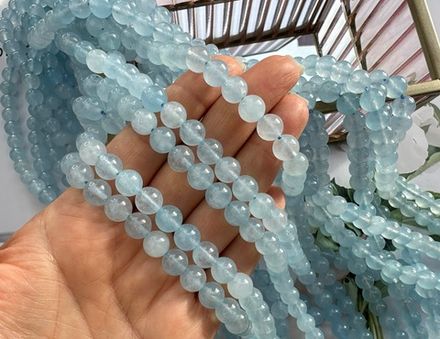 Нить бусин из тонированного кварца 8мм, гладкие