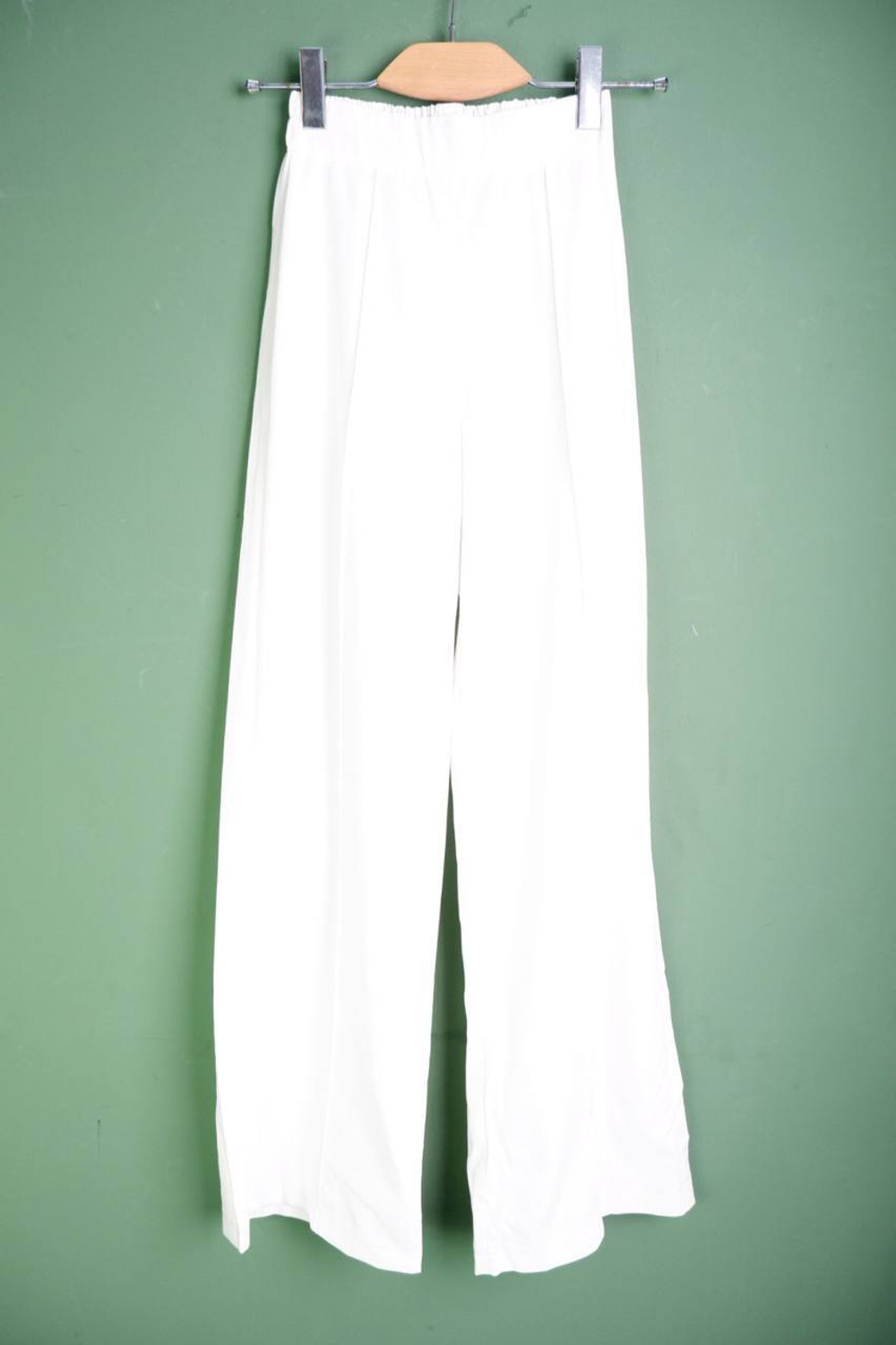 Брюки свободного кроя, светлые, визуально на 40 размер