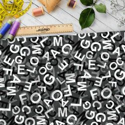 Ткань оксфорд 600 хаос их букв на чёрном фоне