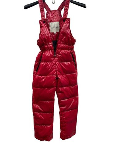 Пуховой комбинезон Moncler