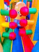 Коммерческий надувной батут «Смайлики» с крышей, размер 12*8*7 м