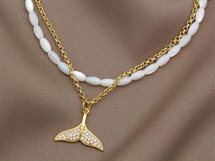 Нить бусин из перламутра "Рис" 3х5мм