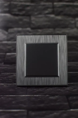 Выключатель одноклавишный серый