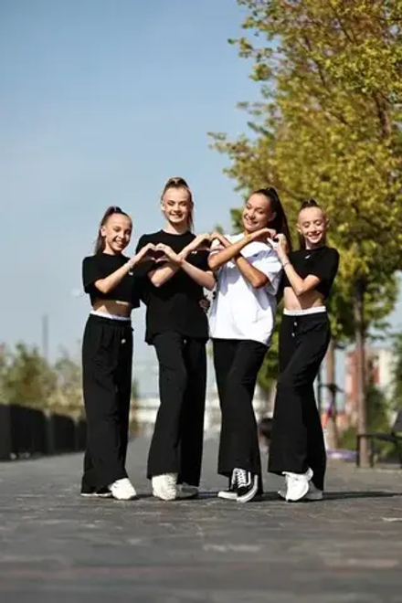 Брюки палаццо с белыми вставками для девочки