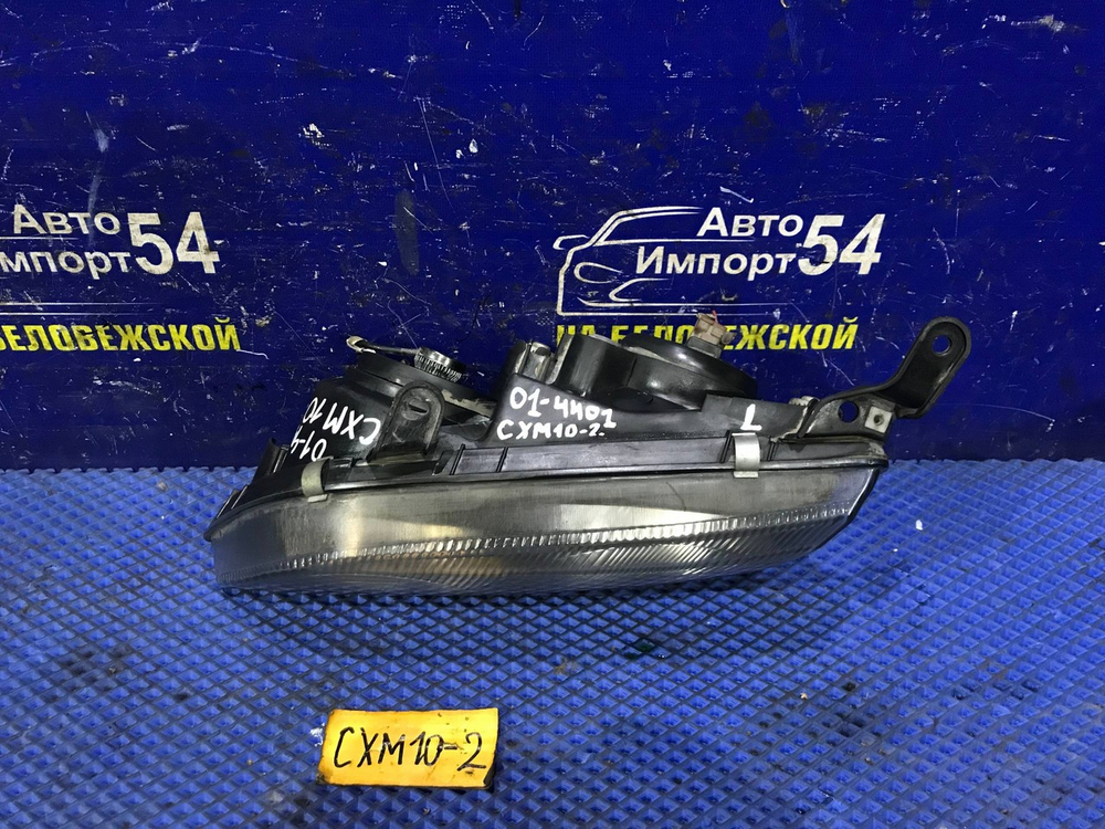 Фара передняя левая TOYOTA IPSUM 1997