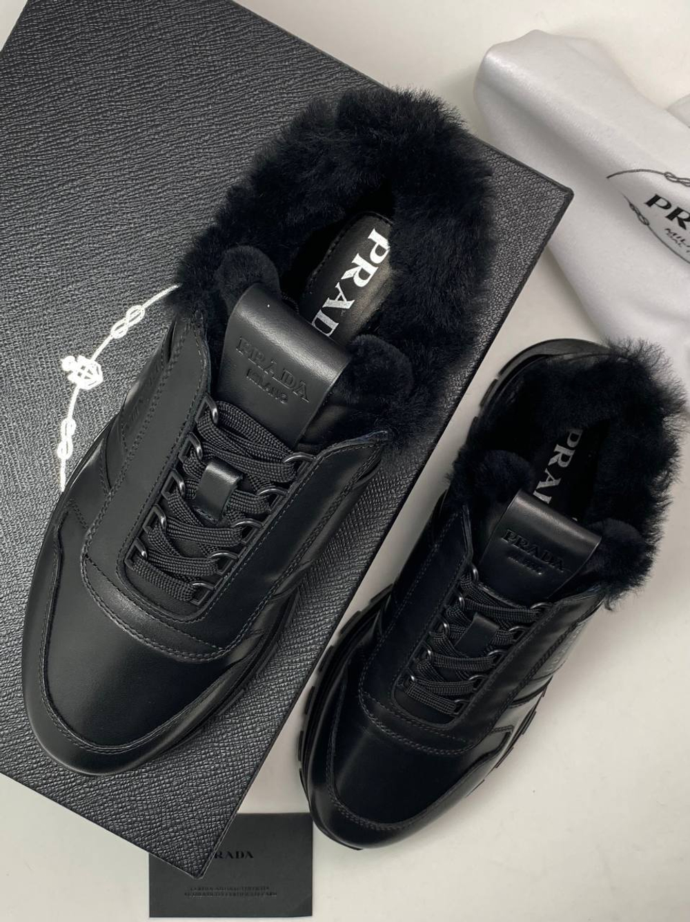 Кроссовки Prada