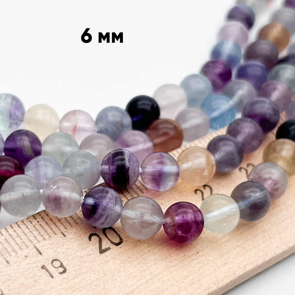Флюорит бусины, диаметр около 6,2-6,6 мм, цена за 30-31 шт (1/2 нити)